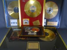 THE BEATLES - five framed limited edition commemorative music discs: Sgt Pepper's Lonely Hearts