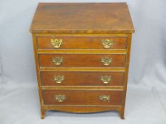 NEATLY PROPORTIONED REPRODUCTION MAHOGANY CHEST of four drawers, having fancy pierced brass back