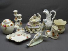 CONTINENTAL PORCELAIN CENTRE PIECE of a young woman and baby in crib, a Spanish porcelain