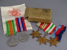 WWII MEDAL GROUP OF FIVE - all unmarked to include the 39-45 Star, Africa and Italy Stars Defence
