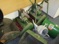 TWO PETROL LAWNMOWERS with associated grass collection boxes and a galvanized watering can