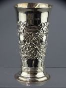 FLORAL EMBOSSED SILVER BEAKER, London 1895, Maker James Wakely & Frank Clarke Wheeler, 13cms H, 5.