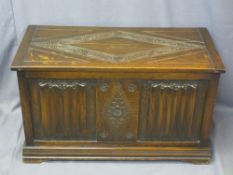 QUALITY VINTAGE OAK BLANKET CHEST with linen fold and carved front decoration, 56cms H, 95cms W,