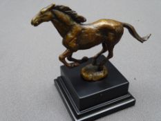 BRONZART SCULPTURE titled 'Galloping Stallion', signed 'Kim B' product code 503, mounted upon a