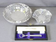 SILVER - bonbon dishes, one 21cms diameter, the other 12cms diameter and a cased silver handled
