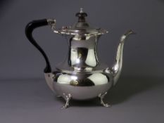 SILVER COFFEE POT, heavy and of baluster form on four raised feet with pie crust rim, Sheffield