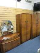 VINTAGE FIGURED WALNUT THREE PIECE BEDROOM SUITE consisting of lady's and gent's wardrobes and a