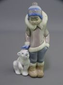 LLADRO - standing Eskimo boy with pet polar bear alongside