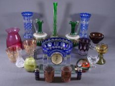 VINTAGE & ANTIQUE GLASSWARE, a collection including blue facet cut, Cranberry, green glass decanters