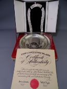 JOHN PINCHES COMMEMORATIVE SILVER and a cased white metal necklace, the commemorative titled 'The