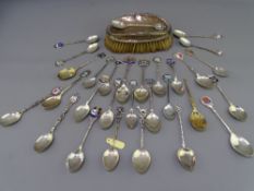 BRITISH & CONTINENTAL SILVER & ENAMEL COLLECTOR'S SPOONS and a silver topped clothes brush, 9.4 troy