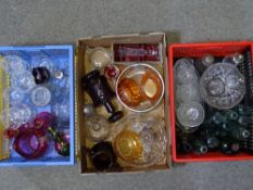 GLASSWARE, a good mixed selection including cut and other decanters, Cranberry and Carnival