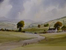 R WITCHARD watercolour - expansive landscape with farmstead and figure with a cart on a track,