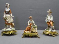 ITALIAN FIGURINES - a trio on metal bases
