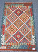 VEGETABLE DYE WOOL CHOBI KILIM RUG - vibrant colourful central diamond pattern with bordered edge,