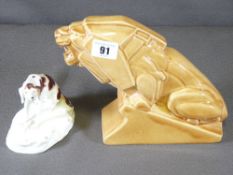 ASHTEAD POTTERS ART DECO STYLE LION ORNAMENT and a Staffordshire hound