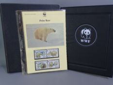FIRST DAY COVERS - attractive album of WWF complete with protective box cover