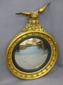 REGENCY STYLE CONVEX WALL MIRROR, circular format with bobble detail and eagle surmount, 95cms