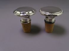NEW SILVER PLATED BOTTLE STOPPERS, A PAIR, with flared tops and rope edging, in Asprey Bond Street