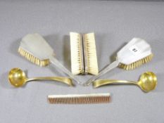 SILVER FIVE PIECE BRUSH SET INCLUDING COMB in Art Deco style and a pair of gilt spoons