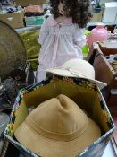 CIRCA 1990 PORCELAIN DOLL produced by Jane Zidjunas, on a stand, and a Marshall & Snelgrove hat