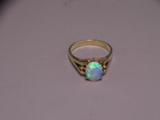 18CT GOLD OPAL DRESS RING having an oval cabochon opal of approximately 9 x 7mms, visual estimate
