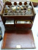 WOODEN CHEMIST'S BOX containing various bottles and microscope slides for Flatters & Garnett