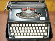 CASED TYPEWRITER - Brother Deluxe 220