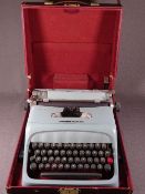 VINTAGE CASED OLIVETTI STUDIO 44 PORTABLE TYPEWRITER