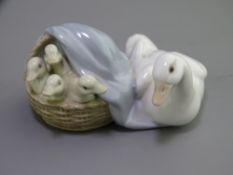 LLADRO - group of a white goose with four goslings in a basket