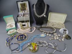 QUALITY COSTUME JEWELLERY and glass paperweights to include an unmarked, untested stone type set