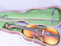 VIOLIN - in a hard case with bow with spurious label, Antonius Stradivarius Cremonensis ...