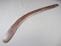 AUSTRALIAN ABORIGINAL BOOMERANG, chip carved with linear top detail, 78cms across