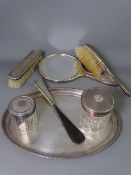 SEVEN PIECE DRESSING TABLE SET including an oval tray, mixed Birmingham hallmarks, 1916-1924, one