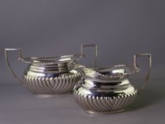LARGE SILVER SUGAR BOWL & CREAM JUG in half reeded pattern with rope and shell border, Chester 1929,