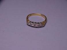 EIGHTEEN CARAT GOLD FIVE STONE DIAMOND RING, 0.45 collective carat value, 4grms, size Q (visible
