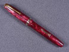 CONWAY STEWART - Vintage 1950s red pearl and gold veined marble Conway Stewart No 84 fountain pen
