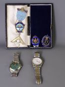 THREE MASONIC JEWELS and two gent's wristwatches, the enamel to one badge marked 'Royal Masonic