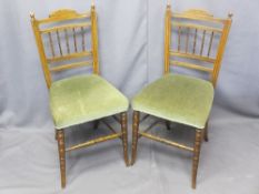 TWO EDWARDIAN PARLOUR CHAIRS, spindlebacked on turned front supports