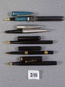PENS - two Mabie Todd and a Waterman Ideal with nine carat gold band ETC