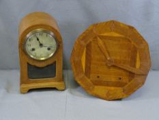 CLOCKS - an oak cased dome top mantel clock and an unusual Deco walnut wall clock