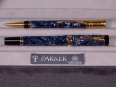 PARKER - 1996 blue marble Parker Duofold International fountain pen and ballpoint pen set with