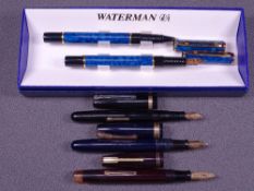 WATERMAN - Two vintage 1940s black Waterman Emblem fountain pens with gold trim and 14ct gold