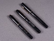 MABIE TODD - Three vintage (1930s-1940s) black Swan Mabie Todd fountain pens with gold trim and 14ct