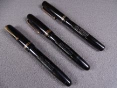 MABIE TODD - Three vintage (1940s-1950s) lack Swan Mabie Todd fountain pens with gold trim and