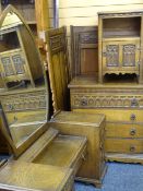 VINTAGE PRIORY STYLE OAK BEDROOM SUITE, four pieces to include dressing table with large shaped
