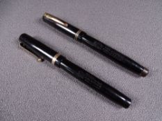 MABIE TODD - Two vintage (1930s-1940s) black Swan Mabie Todd fountain pens with gold trim and 14ct