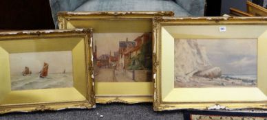 ERNEST MARILLIER three watercolours - chalk cliff and beach, fishing boats in choppy seas and town