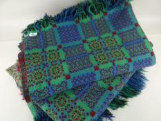 PAIR OF WELSH BLANKETS woven blue, green and red with fringes (one faded)