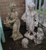 FOUR GARDEN ORNAMENTS including a pair of statues of boys and girls, 76cms high, tortoise, owl